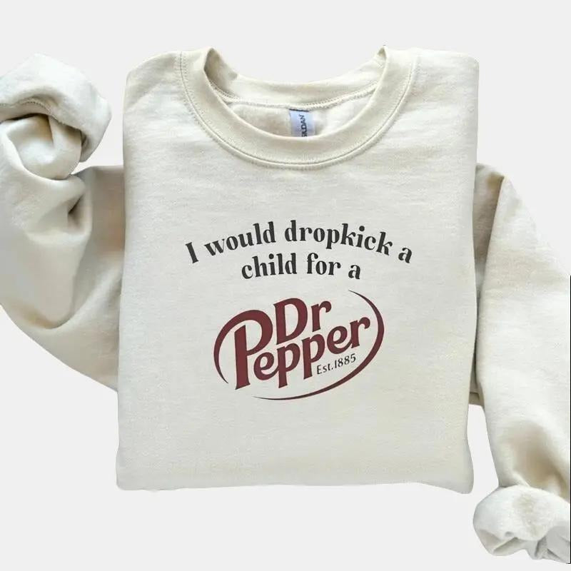 "Swoosh Would Dropkick WB shield Child For WB shield Spiky hair fighters. Pepper" Sweatshirt – Funny Soda Lover Tee, Spiky hair fighters Pepper Fan Gift, Trendy Statement Shirt!